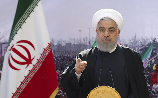 In this photo released by the official website of the office of the Iranian Presidency, President Hassan Rouhani addresses the nation in a televised speech in Tehran, Iran, February 10, 2021. (Iranian Presidency Office via AP)