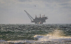 View of the Israeli Leviathan gas field gas processing rig as it seen from Dor Habonim Beach Nature Reserve, on January 1, 2020. (Flash90)