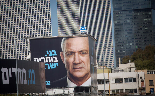 Election campaign posters showing Blue and White party leader Benny Gantz next to the Ayalon Highway in Tel Aviv. February 1, 2021. (Miriam Alster/FLASH90)
