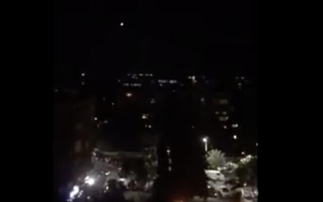 Footage from Syrian state media said to show air defense missiles being fired near Damascus in response to Israeli strikes, February 28, 2021. (Screen capture: Twitter)