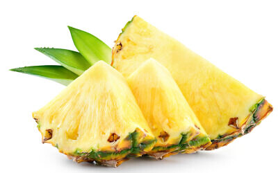Illustrative image of pineapple slices with leaves (Tim UR; iStock by Getty Images)