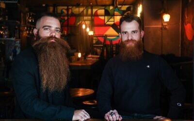 Bar Pinto (R) and Gilad Levi, two red-bearded 29-year-olds and founders of 'Beard for All' ('Ptor Zakan' in Hebrew), a campaign challenging Israeli military rules compelling all male troops to be cleanshaven, in Tel Aviv on February 7, 2021 (Emmanuel DUNAND / AFP)