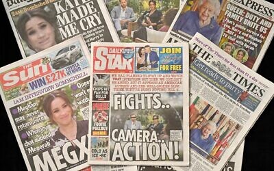 An arrangement of UK daily newspapers photographed as an illustration in Brighton on March 8, 2021, shows front page headlines reporting on the story of the interview given by Meghan, Duchess of Sussex, wife of Britain's Prince Harry, Duke of Sussex, to Oprah Winfrey, which aired on US broadcaster CBS (Glyn KIRK / AFP)