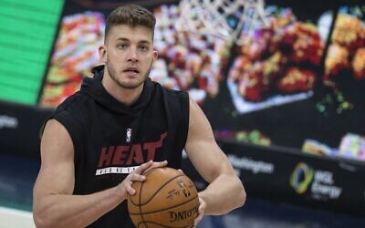 Meyers Leonard of the Miami Heat warms up before a game against the Washington Wizards at Capital One Arena on January 9, 2021, in Washington. (Scott Taetsch/Getty Images North America/AFP)