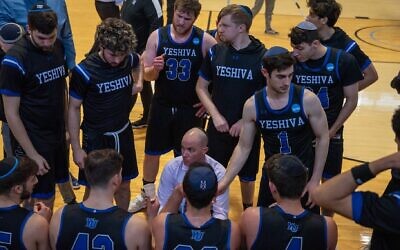 Coach Elliot Steinmetz instructs his Yeshiva University men's basketball team during its historic 2019-20 season. (YU Athletics)