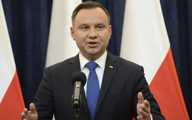 Polish President Andrzej Duda announces his decision to sign legislation penalizing certain statements about the Holocaust, in Warsaw, Poland, on February 6, 2018. (AP Photo/Alik Keplicz)