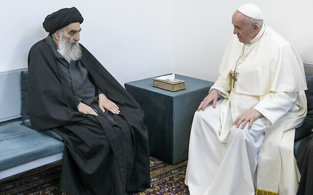 Pope Francis, right, meets with Iraq's leading Shiite cleric, Grand Ayatollah Ali al-Sistani in Najaf, Iraq, March 6, 2021 (AP Photo/Vatican Media)
