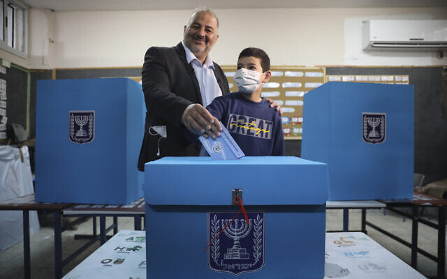 MK Mansour Abbas, leader of Ra'am, votes in Israel's parliamentary election at a polling station in Maghar, Israel, March 23, 2021. (AP Photo/Mahmoud Illean, File)