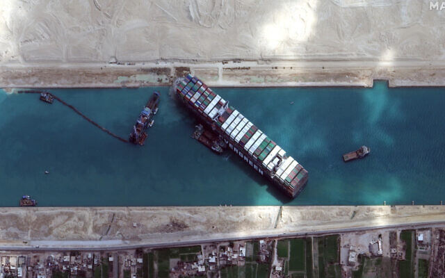 This satellite image from Maxar Technologies shows the cargo ship MV Ever Given stuck in the Suez Canal near Suez, Egypt, March 28, 2021. (©Maxar Technologies via AP)