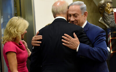 Israeli Prime Minister Benjamin Netanyahu greets then-US vice president Joe Biden upon his arrival to the prime minister’s office in Jerusalem, Wednesday, March 9, 2016. (Debbie Hill, Pool, via AP)