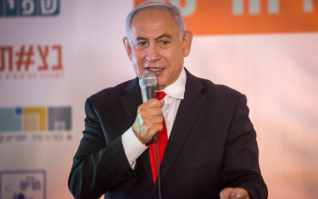 Prime Minister Benjamin Netanyahu speaks during a ceremony for a new neighborhood in the northern town of Harish, on March 9, 2021. (Flash90)
