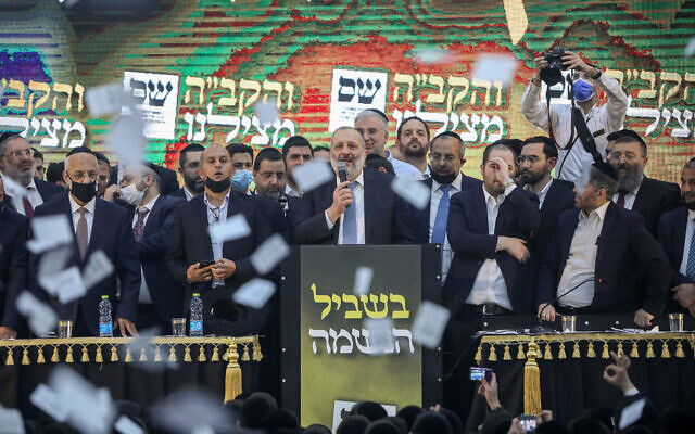 Shas chief Aryeh Deri addresses supporters on election night at party headquarters in Jerusalem, March 23, 2021. (Noam Revkin Fenton/Flash90)