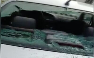 Screen capture from video a car damage in a suspected hate crime in the West Bank Palestinian village of Huwara, March 2, 2021. (Channel 12 News)
