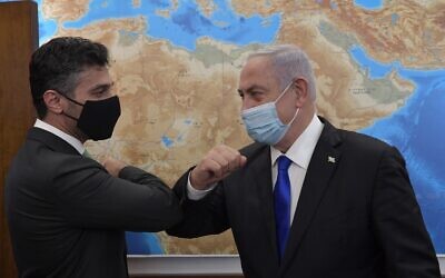File: Prime Minister Benjamin Netanyahu (R) meets with the UAE's new ambassador to Israel Mohammad Mahmoud Al Khajah at his Jerusalem office on March 2, 2021. (Kobi Gideon/GPO)
