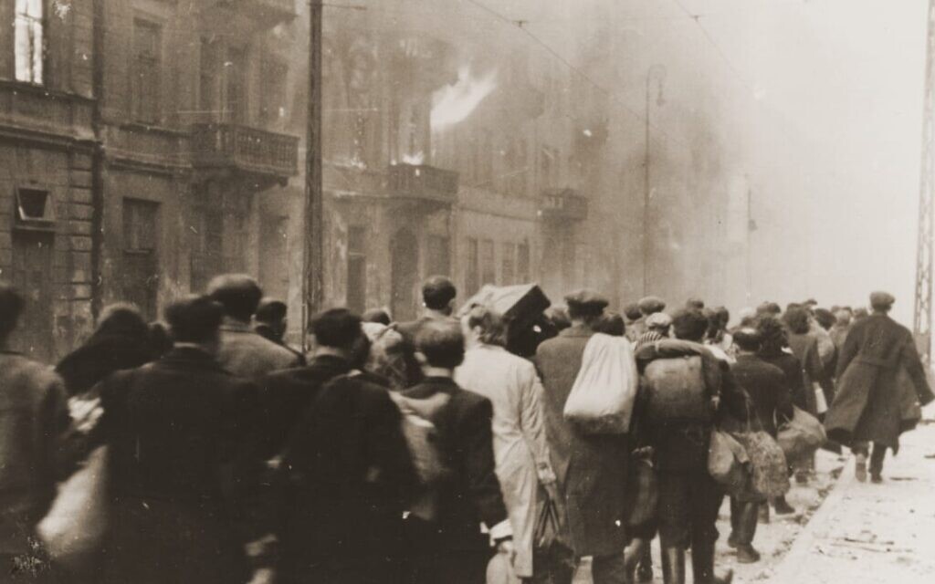 Jews marched out of the ghetto during the Warsaw Ghetto Revolt in April and May, 1943. (public domain)