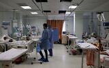 This picture taken on April 22, 2021 shows a general view of nurses and patients at the COVID-19 coronavirus intensive care unit at the Turkish-Palestinian Friendship Hospital in Gaza City. (Emmanuel DUNAND / AFP)