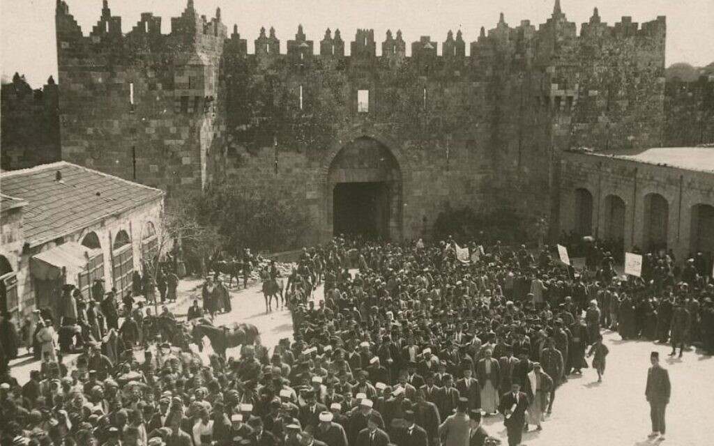 Palestinian Arabs gather at the Damascus Gate in Jerusalem, in an anti-Zionist demonstration on March 8, 1920, prior to the Nabi Musa holiday on which violent rioting took place. (Public domain)