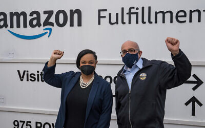 Rep. Nikema Williams of Georgia and RWDSU President Stuart Appelbaum visit the Amazon Fulfillment Center in Birmingham, Alabama, after meeting with workers and organizers involved in the facility's unionization effort, March 5, 2021. (Megan Varner/Getty Images/JTA)