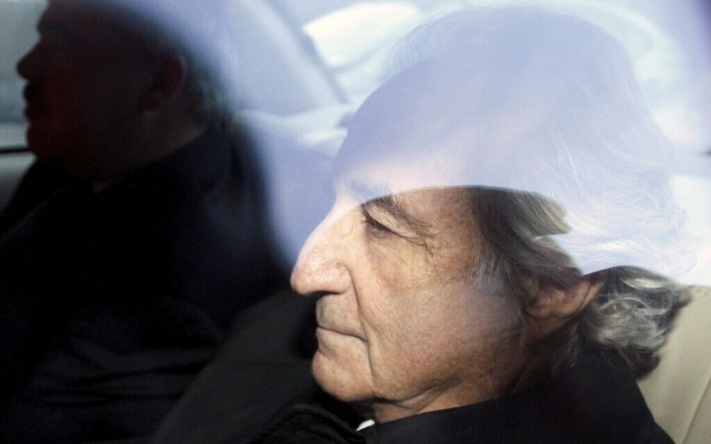 Illustrative: Bernard Madoff, right, leaves US District Court in Manhattan, New York, after a bail hearing, January 5, 2009.  (AP Photo/Kathy Willens, File)