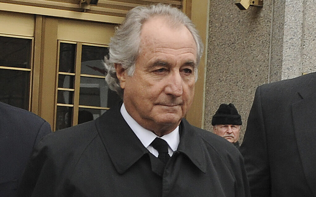 Bernard Madoff exits Manhattan federal court in New York, March 10, 2009. (AP Photo/ Louis Lanzano, File)