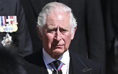 Britain's Prince Charles sheds a tear as he follows the coffin as it makes its way past the Round Tower during the funeral of Britain's Prince Philip, inside Windsor Castle in Windsor, England, April 17, 2021. (Leon Neal/Pool via AP/ File)