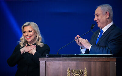 Prime Minister Benjamin Netanyahu and his wife Sara on the night of the Israeli elections, at the party headquarters in Tel Aviv, on March 3, 2020 (Olivier Fitoussi/Flash90)
