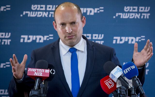 Yamina leader Naftali Bennett speaks during a faction meeting at the Knesset on April 6, 2021. (Olivier Fitoussi/Flash90)