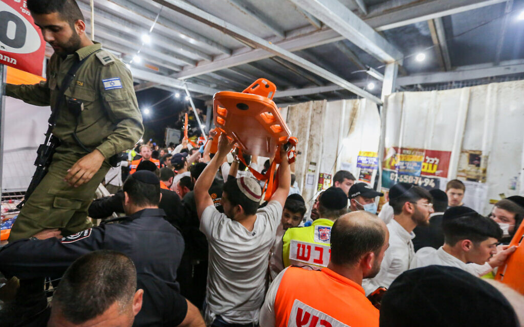 Israeli rescue forces and police at a mass fatality scene during a gathering for the Jewish holiday of Lag B'Omer on Mt. Meron, in northern Israel, on April 30, 2021. (David Cohen/Flash90)