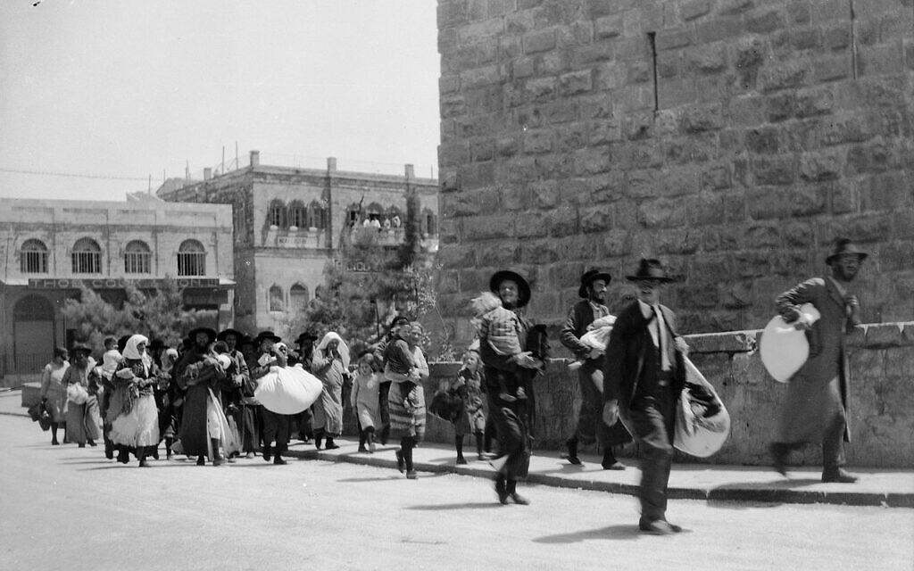 Illustrative: Jewish families flee Arab rioting in Jerusalem's Old City in August 1929. (Public domain)