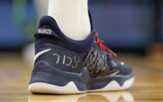 "Yizkor" is seen written on Washington Wizards player Deni Avdija's shoe, for Israel's Holocaust Remembrance Day, April 7, 2021. (Screen capture: Twitter)