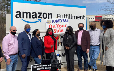 Democratic members of Congress join representatives of the Retail, Wholesale and Department Store Union gather outside an Amazon fulfillment center in Bessemer, Alabama, on March 5, 2021, to advocate for the ongoing unionization vote at the sprawling campus. The elected officials pictured include, starting second from left, Rep. Jamaal Bowman of New York, Nikema Williams of Georgia, Terri Sewell of Alabama, Cori Bush of Missouri and Andy Levin of Michigan. (AP Photo/Bill Barrow)