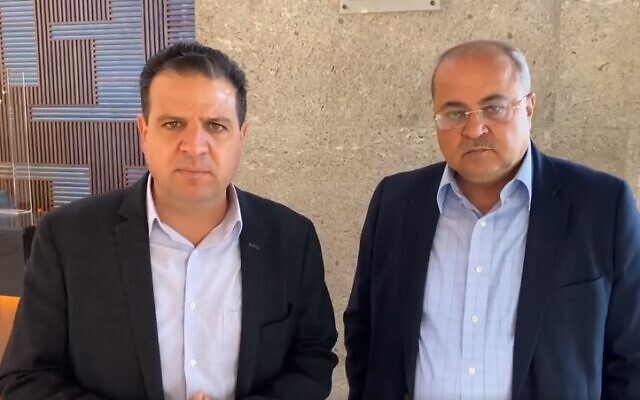 Joint List's Ayman Odeh and Ahmad Tibi give a statement after their meeting with Yesh Atid leader Yair Lapid in Tel Aviv, April 1, 2021. (Screen grab)