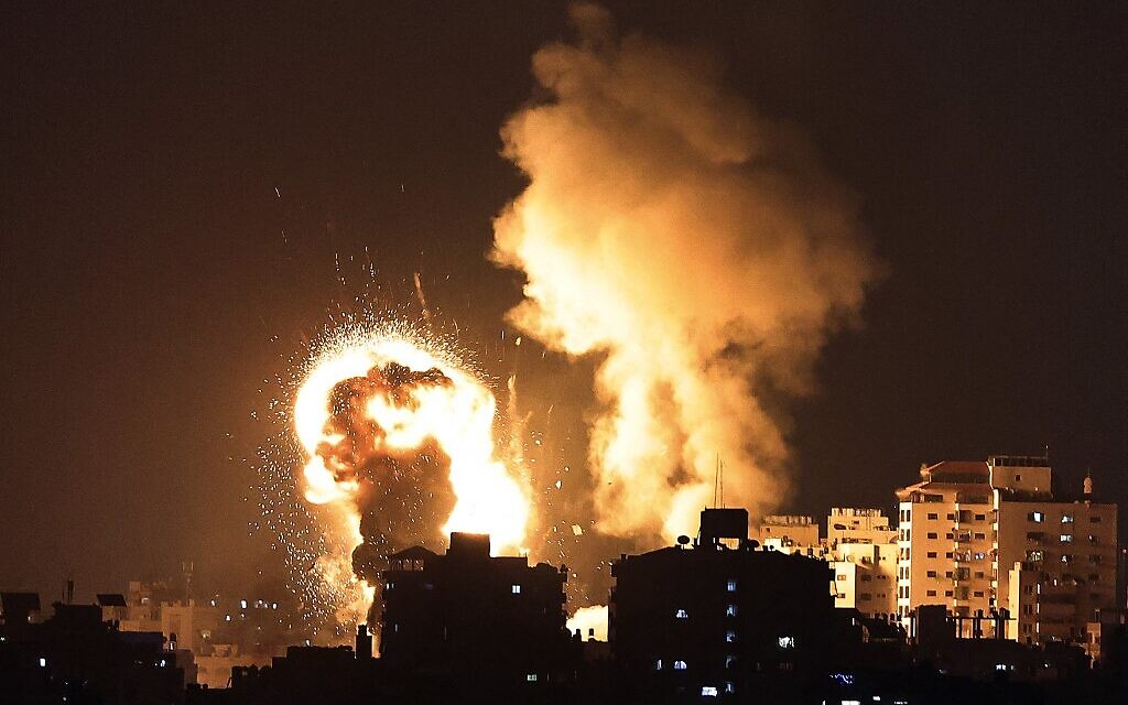 Fire billows from Israeli air strikes in the Gaza Strip, controlled by the Palestinian Islamist movement Hamas, on May 10, 2021. (MAHMUD HAMS / AFP)