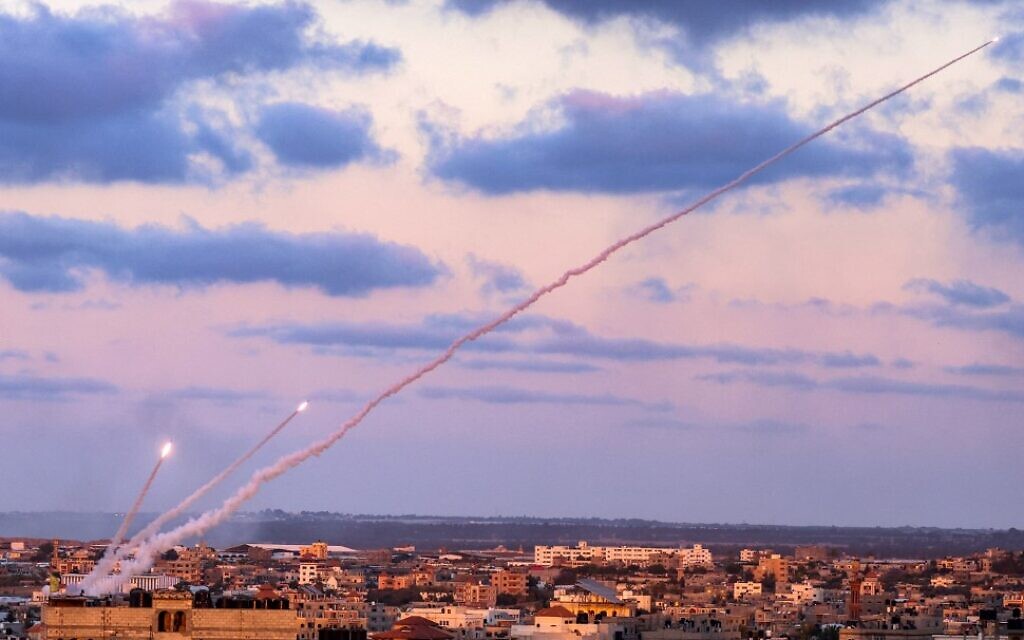 Rockets are launched by Palestinian terrorists in the southern Gaza Strip toward Israel, May 17, 2021. (Said Khatib/AFP)