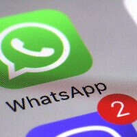 Illustrative: The WhatsApp communications app on a smartphone, (AP Photo/Patrick Sison)