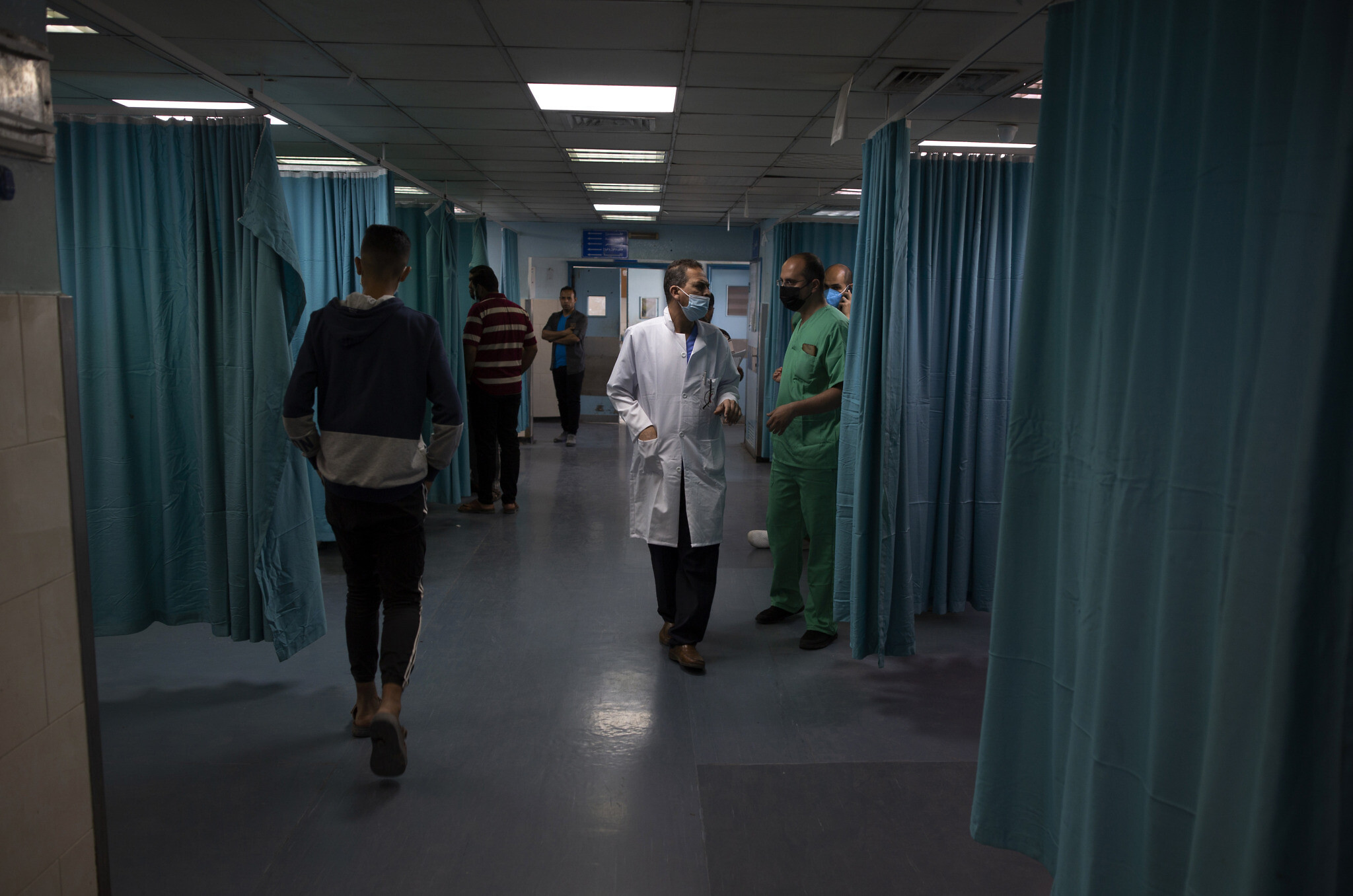 Gaza's hospitals, already struggling amid COVID, now face wounded from
