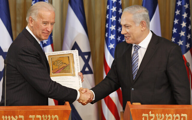 Then-US vice president Joe Biden shakes hands with Prime Minister Benjamin Netanyahu at the Prime Minister's Residence, in Jerusalem, March 9, 2010. (Ariel Schalit/AP/File)