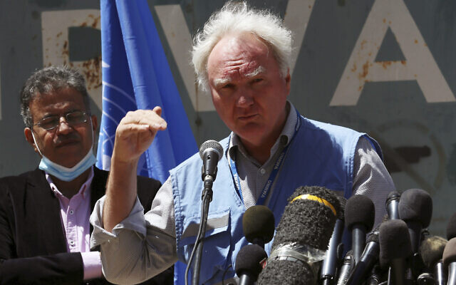 Matthias Schmale, UNRWA's director in Gaza, speaks during a news conference in front of the UNRWA headquarters in Gaza City, Wednesday, May 19, 2021. (AP Photo/Adel Hana)