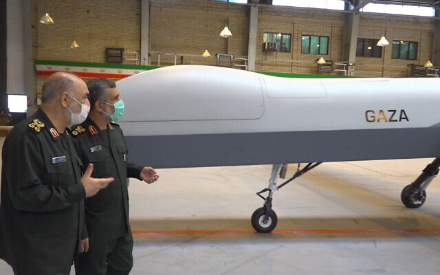 Illustrative: Iranian Revolutionary Guard Commander Gen. Hossein Salami, left, and the Guard's aerospace division commander Gen. Amir Ali Hajizadeh talk while unveiling a new drone called 'Gaza,' in an undisclosed location in Iran, in a photo released on May 22, 2021. (Sepahnews of the Iranian Revolutionary Guard, via AP)