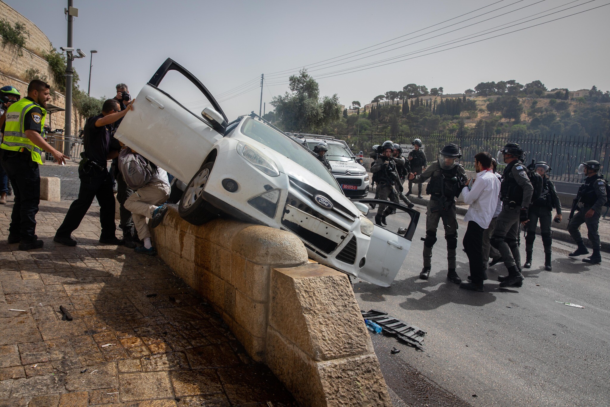 Arab Rioters Attack Jewish Mans Car Near Old City He Crashes Into One Of Them The Times Of