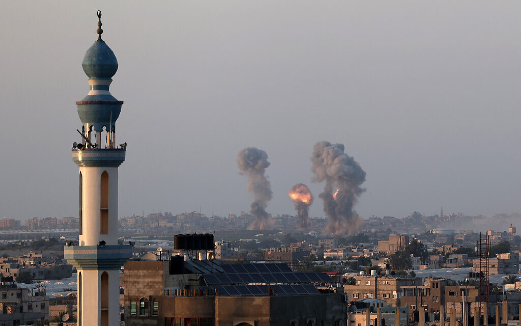 Smoke and flames rise after an Israeli airstrike in the southern Gaza Strip, May 12, 2021. (Abed Rahim Khatib/Flash90)