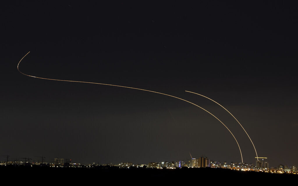 A long exposure picture shows the Iron Dome anti-missile system intercepting rockets fired from the Gaza Strip, as it seen from the southern Israeli city of Ashkelon, May 14, 2021. (Avi Roccah/Flash90)