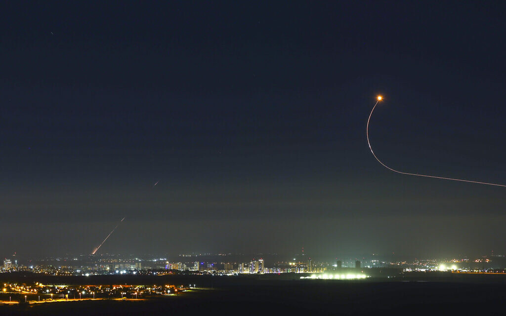 Rockets fired by Hamas terrorists in Gaza into Israel, seen over the central Israeli town of Kiryat Gat on May 18, 2021. (Nati Shohat/Flash90)