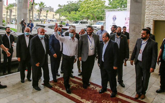 Yahya Sinwar, leader of the Palestinian Hamas movement meets with General Abbas Kamel, Egypt's intelligence chief, as he arrives for a meeting with leaders of Hamas in Gaza City. (Atia Mohammed/Flash90)