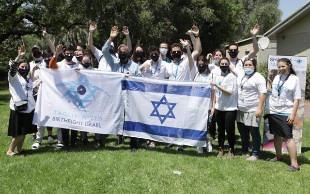 Participants in the first post-COVID Birthright Israel trip, after landing in Israel after a year-long hiatus for the organization, on May 24, 2021. (Erez Uzir/Courtesy)