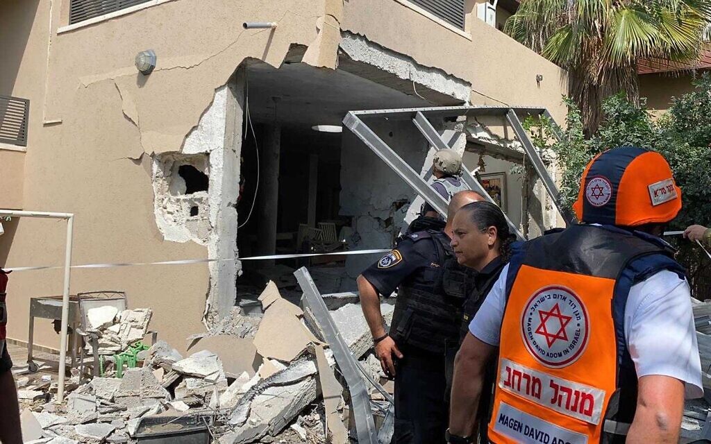 A home hit by a rocket fired from Gaza in the city of Ashkelon, May 20, 2021 (Magen David Adom)