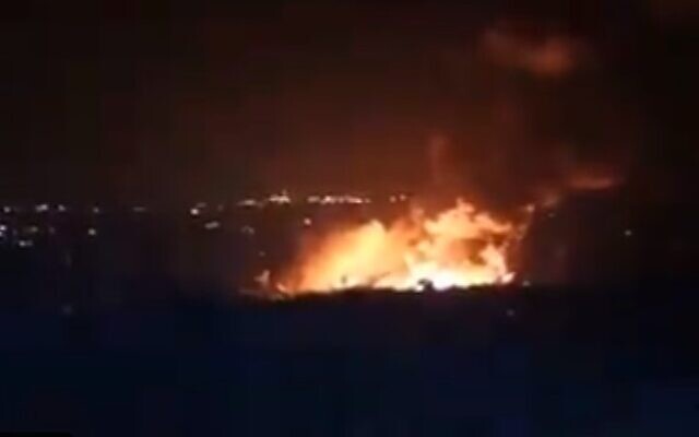 Illustrative: A fire burns in the Syrian port city of Latakia, allegedly caused by and Israeli airstrike on May 5, 2021 (Screencapture/Twitter)
