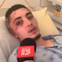 Leon Shranin, 19, was seriously wounded by an Arab mob amid rioting in Jaffa, May 2021. (Screenshot: Channel 13)