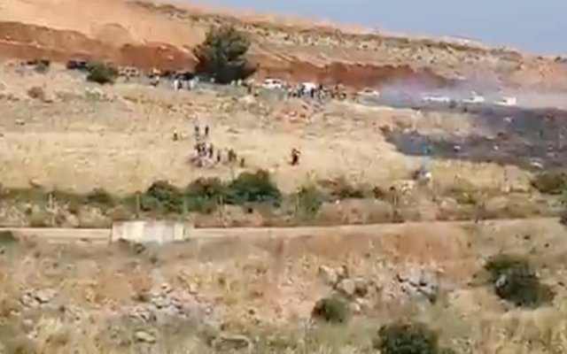 Lebanese protesters demonstrate along their border with Israel on May 14, 2021. (Screen capture/Twitter)