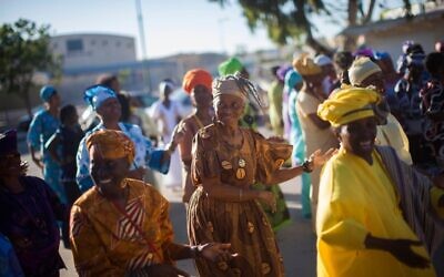 Members of the Hebrew Israelites Community of Dimona dance during festivities marking the Shavuot festival in the southern Israeli town of Dimona, May 26, 2013. (Yonatan Sindel/Flash90/File)
